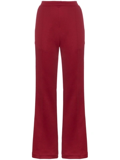 Shop Moncler Side Stripe Cotton-blend Track Pants In Red