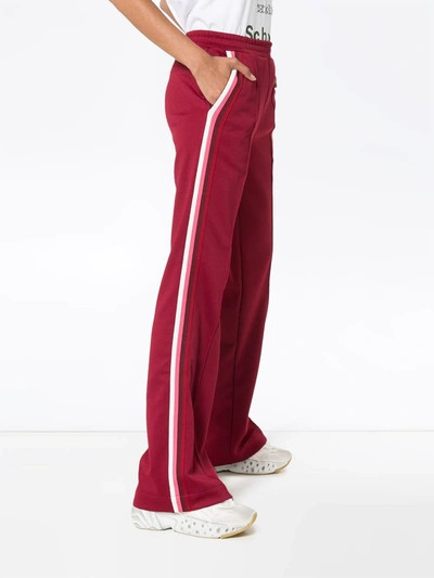 Shop Moncler Side Stripe Cotton-blend Track Pants In Red