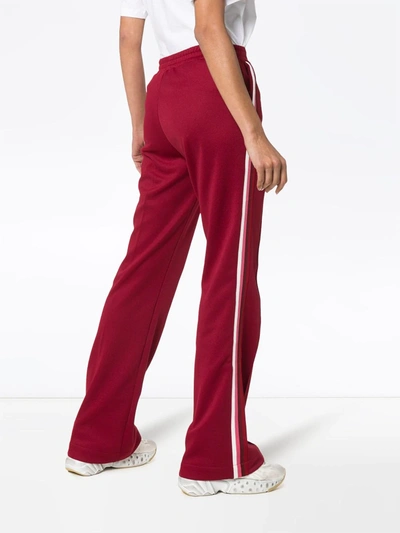 Shop Moncler Side Stripe Cotton-blend Track Pants In Red