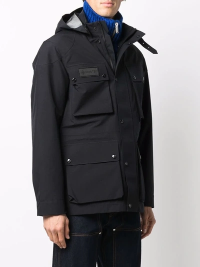 Shop Belstaff Logo-patch Hooded Padded Jacket In 黑色