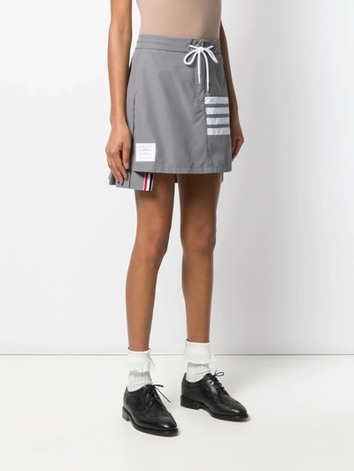Shop Thom Browne Flyweight Tech Pleated 4-bar Miniskirt In Grey