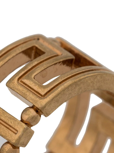 Shop Versace Greca Crystal Ring In Gold