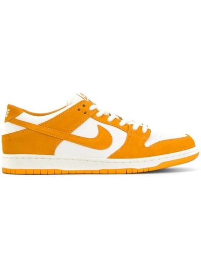 Shop Nike Dunk Low Sneakers In Orange