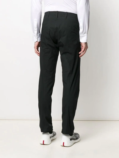 Shop Arc'teryx Slim Fit Trousers In Black