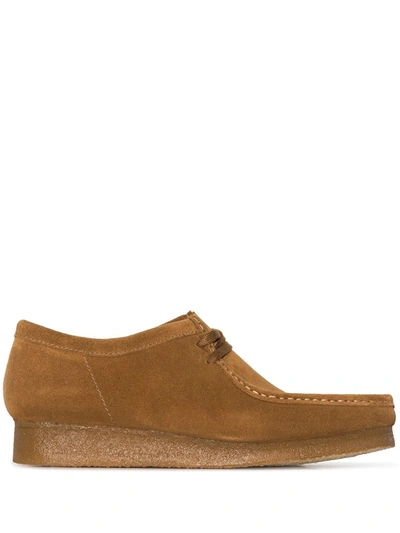 Shop Clarks Originals Wallabee Shoes In Brown