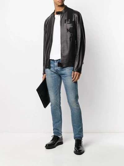 Shop Fendi Debossed Logo Zipped Jacket In Black