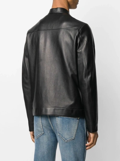 Shop Fendi Debossed Logo Zipped Jacket In Black