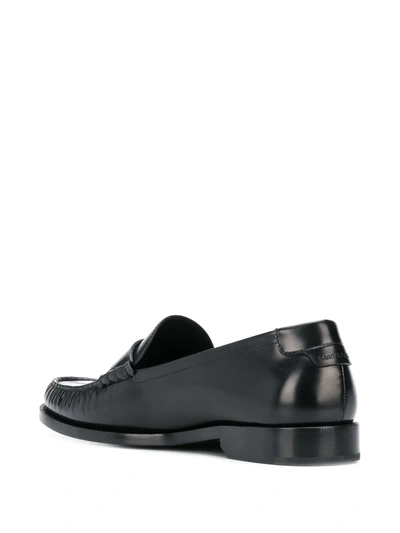 Shop Saint Laurent Monogram Penny Loafers In Black