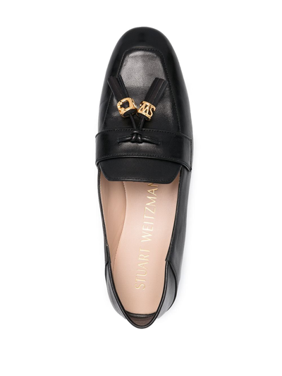 Shop Stuart Weitzman Wylie Tassel-embellished Leather Loafers In Black