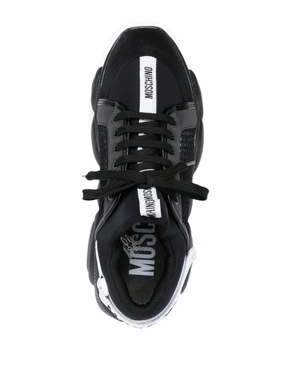 Shop Moschino Teddy Logo-tape Sneakers In Black