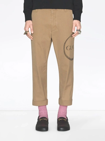 Shop Gucci Ouroboros Print Chino Trousers In Neutrals