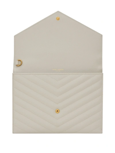 Shop Saint Laurent Monogram Quilted Clutch Bag In 9207 -crema Soft