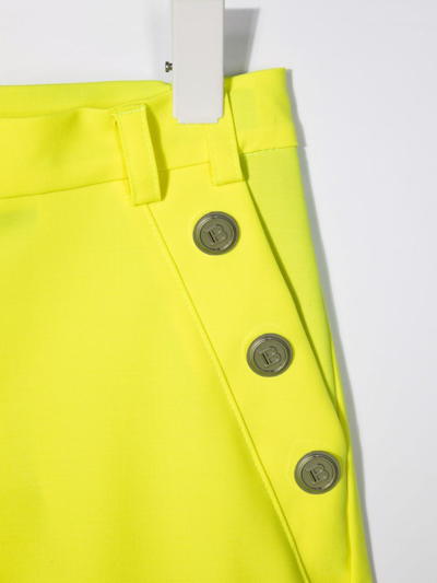 Shop Balmain Decorative-button Tailored Shorts In Yellow