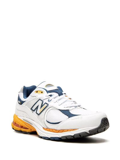 Shop New Balance 2002r "m2002rla" Sneakers In White
