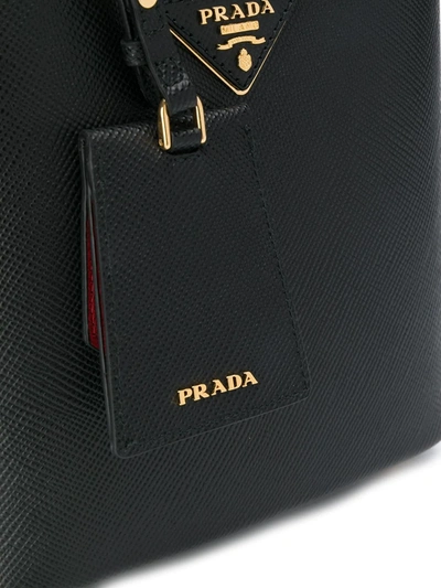 Shop Prada Logo Plaque Bucket Bag In Black