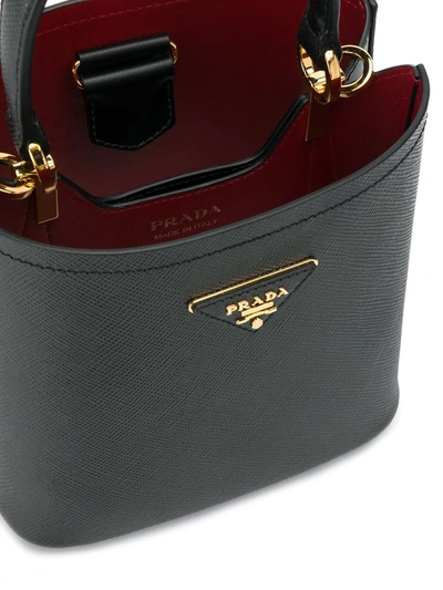 Shop Prada Logo Plaque Bucket Bag In Black