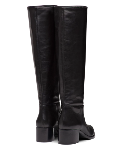 Shop Prada Pointed Toe Knee High Boots In Black