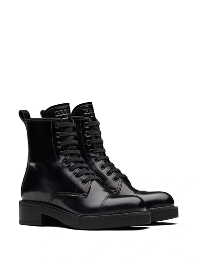Shop Prada Block Heel Combat Boots In Black