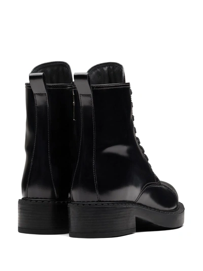 Shop Prada Block Heel Combat Boots In Black