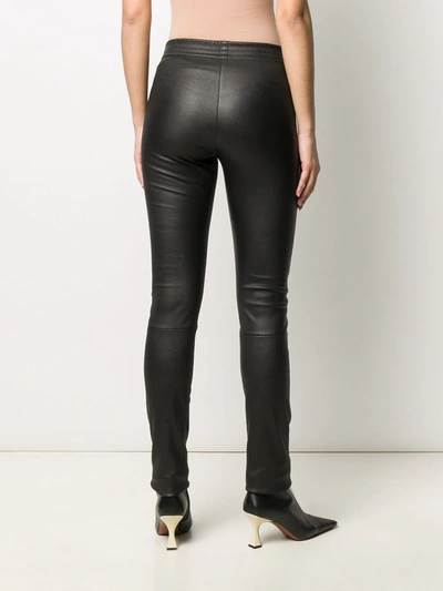 Shop Drome Slim Leather Trousers In Black