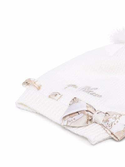 Shop Alviero Martini Bow-detail Knitted Hat In White