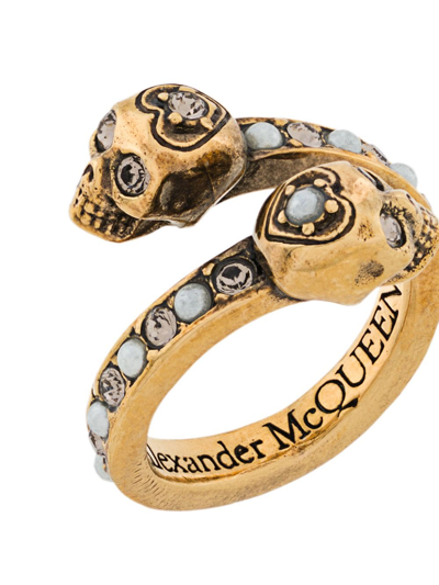 Shop Alexander Mcqueen Wrap-around Skull Ring In Gold