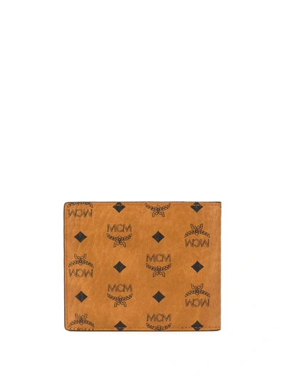 Shop Mcm Small Monogram-print Bi-fold Wallet In Brown