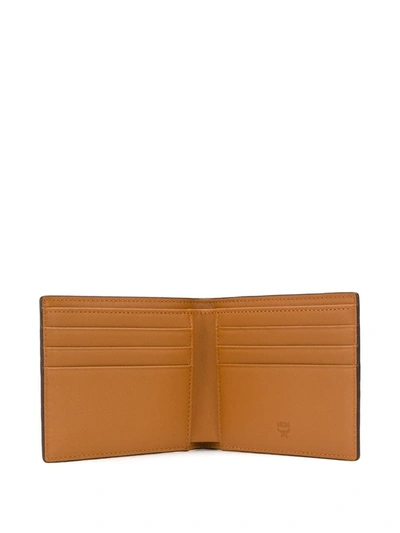Shop Mcm Small Monogram-print Bi-fold Wallet In Brown