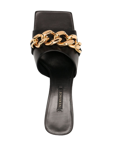 Shop Versace Chain-embellished Mules In Black