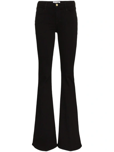 Shop Frame Le High Flared Jeans In Black