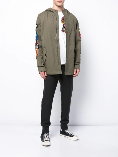 Haculla Hacmania Patch Hooded Coat In Green