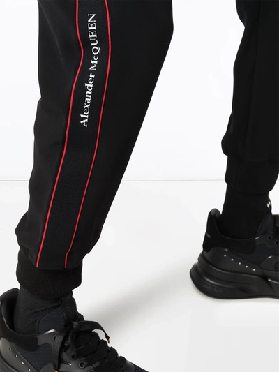 Alexander Mcqueen Logo Tape Track Pants In Black