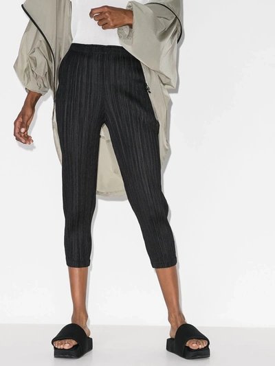 Shop Issey Miyake Plissé Cropped Trousers In Black