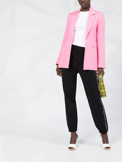 Msgm Embroidered Cotton-blend Fleece Track Pants In Black