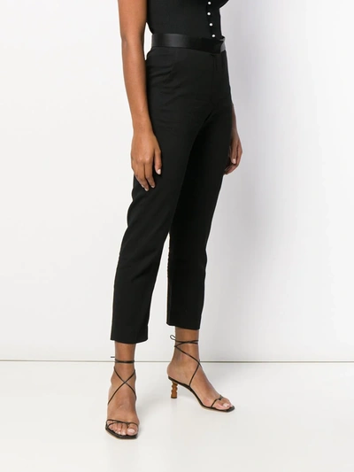 Shop Sandro Quang Trousers In Black