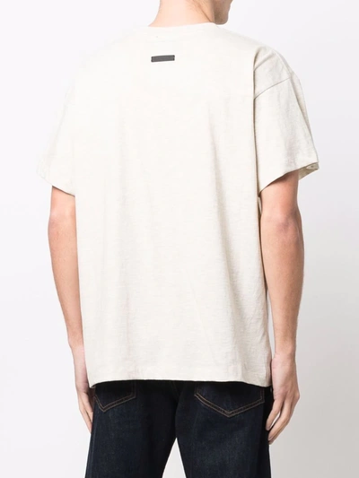 Shop Fear Of God Slogan Print T-shirt In Nude