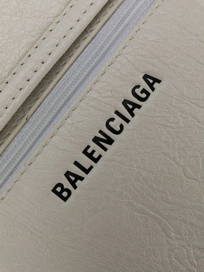 Shop Balenciaga Explorer Pouch Crossbody Bag In White