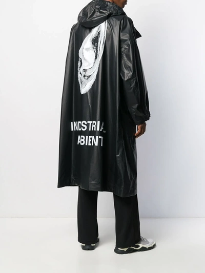 Shop Undercover Rear Print Coat In Black