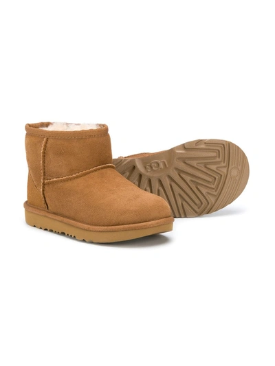 Shop Ugg Classic Mini Ii Boots In Brown