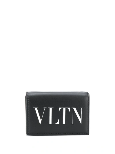 Shop Valentino Vltn Flap Wallet In Black