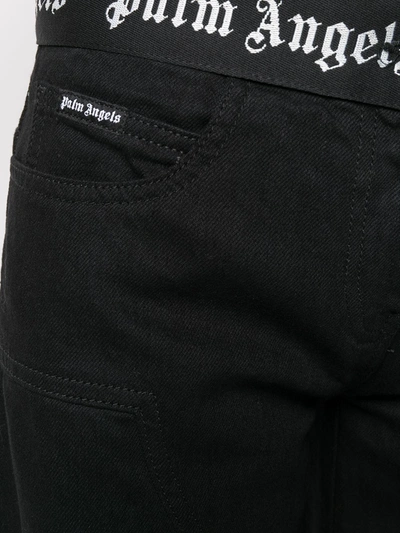 WIDE LEG LOGO WAISTBAND JEANS