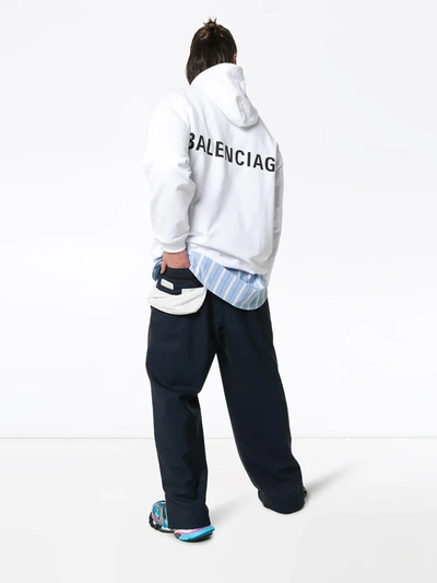 Shop Balenciaga Logo Print Oversized Hooded Jumper In White