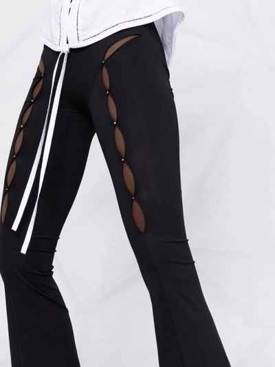 Rui Cut-out Detail Flared Trousers In Schwarz