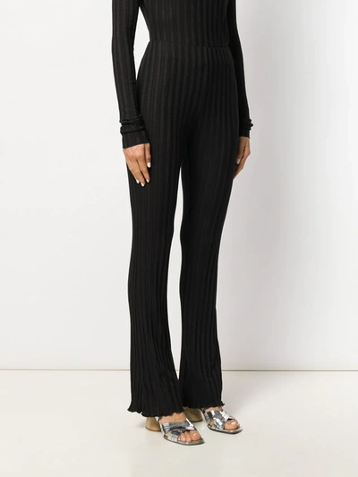 Shop Simon Miller Flared Fitted Trousers In Black