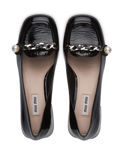 Shop Miu Miu Chain Link-trim Loafers In Black