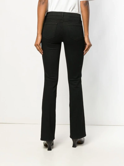 Shop J Brand Bootcut Low-rise Jeans In Black