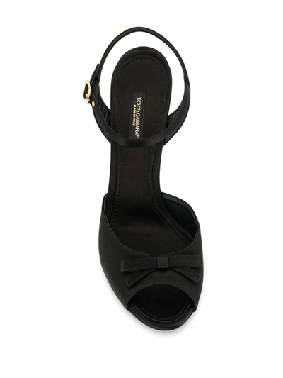 Shop Dolce & Gabbana Peep Toe Bow Sandals In Black