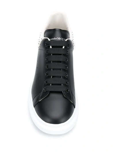 Shop Alexander Mcqueen Oversized Studded Low-top Sneakers In Black