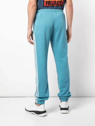 Shop Palace X Adidas Logo Track Pants In Blue