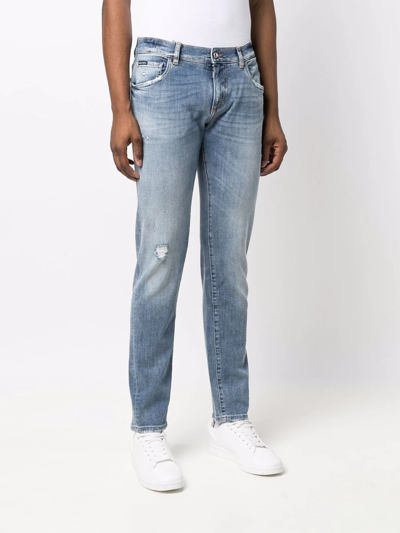 Shop Dolce & Gabbana Distressed Slim-fit Jeans In Blau